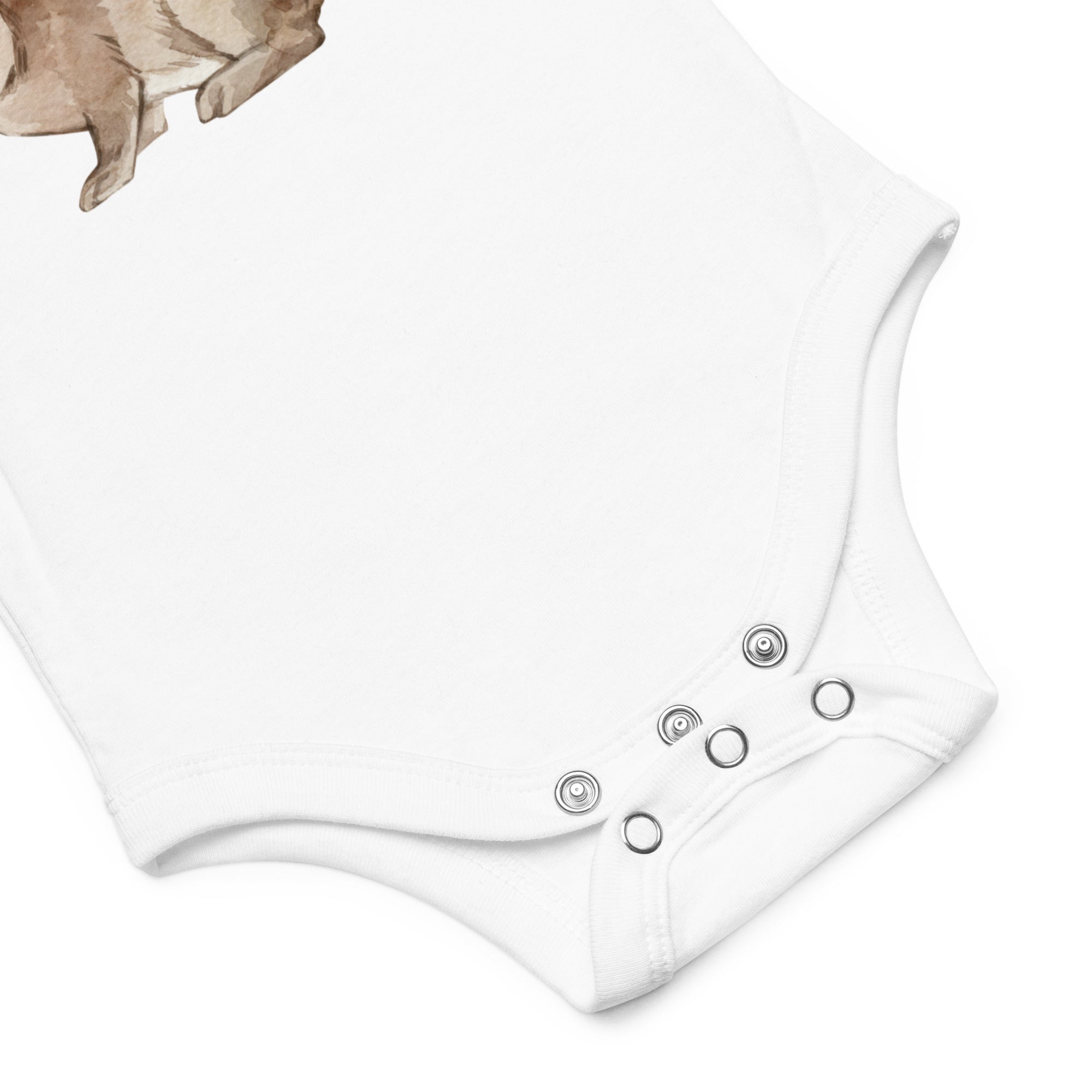 Detail of a white one piece for babies