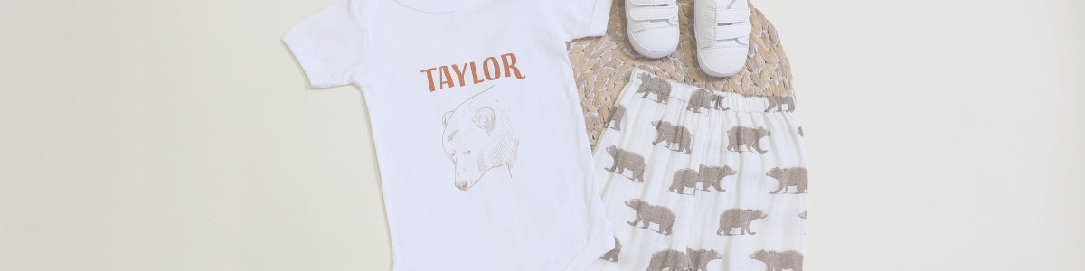 collection of clothing for babies from pineapple and sage