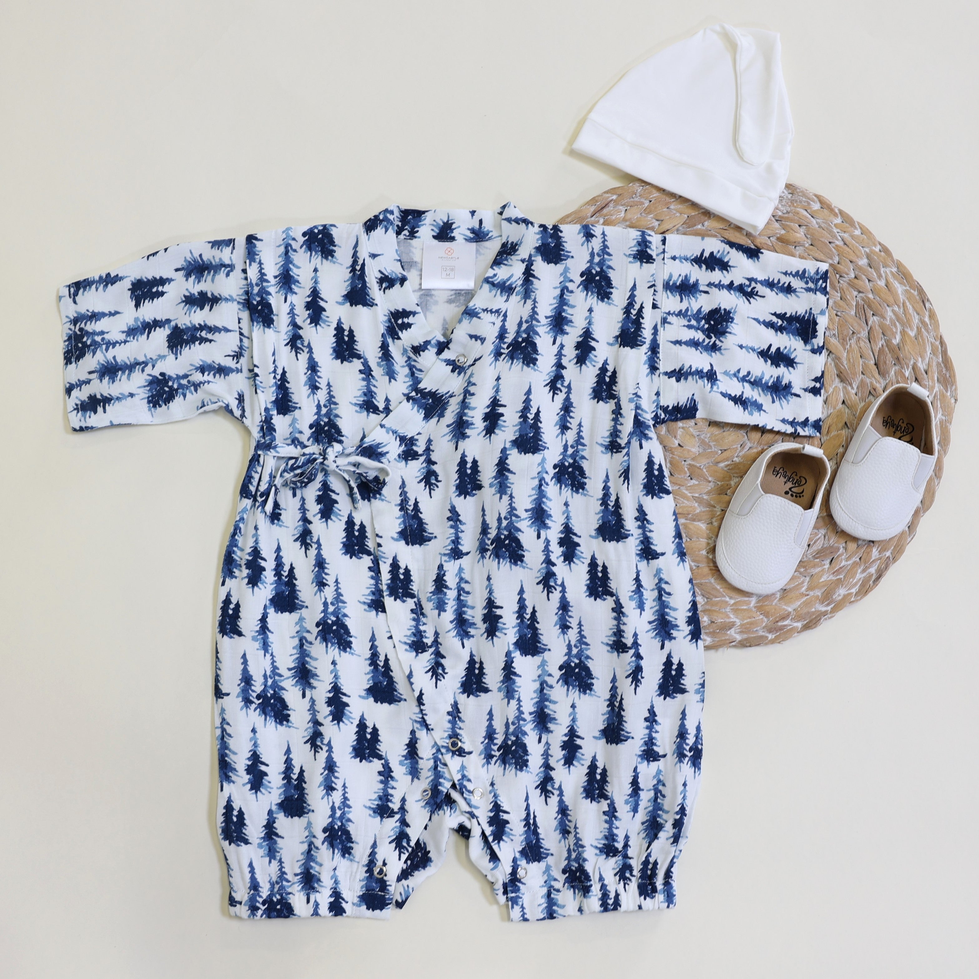 baby jumpsuit with blue forest design