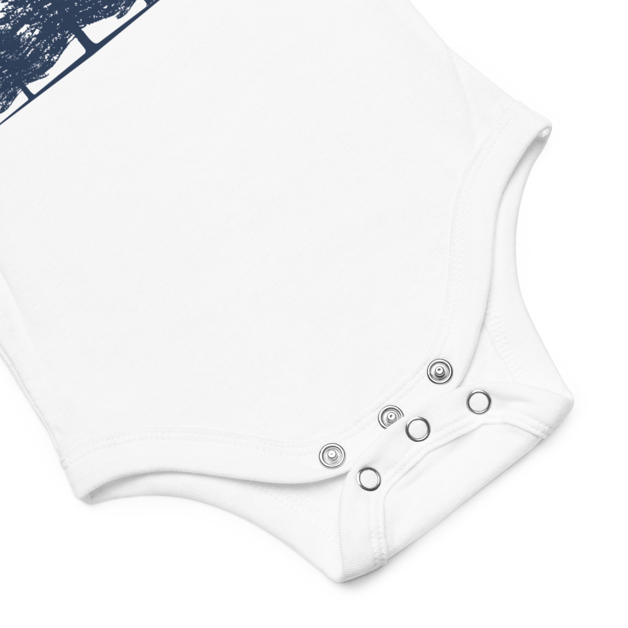 Detail of the indigo forest baby onesie