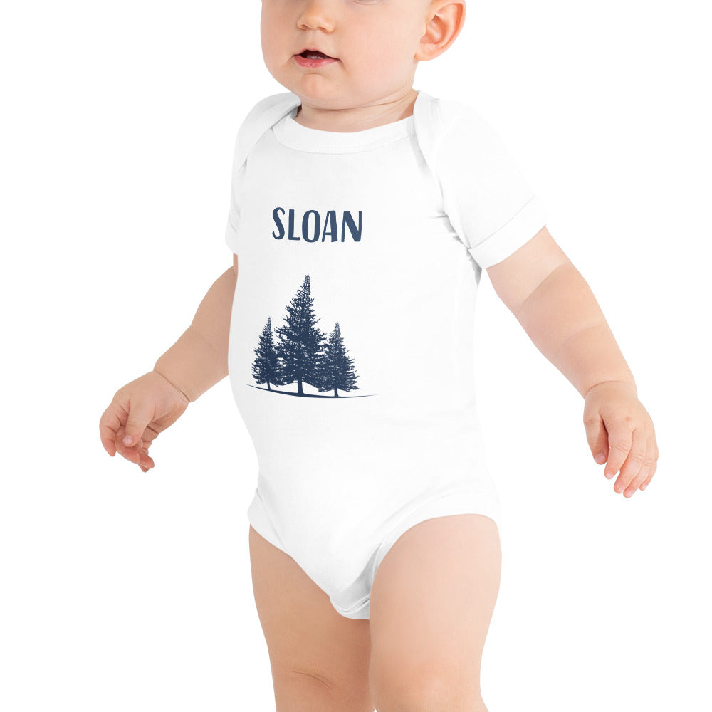 Cute baby wearing a personalized onesie with forest