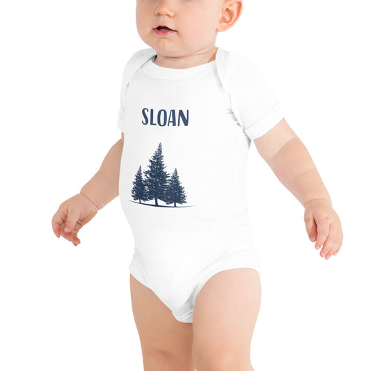 Cute baby wearing a personalized onesie with forest