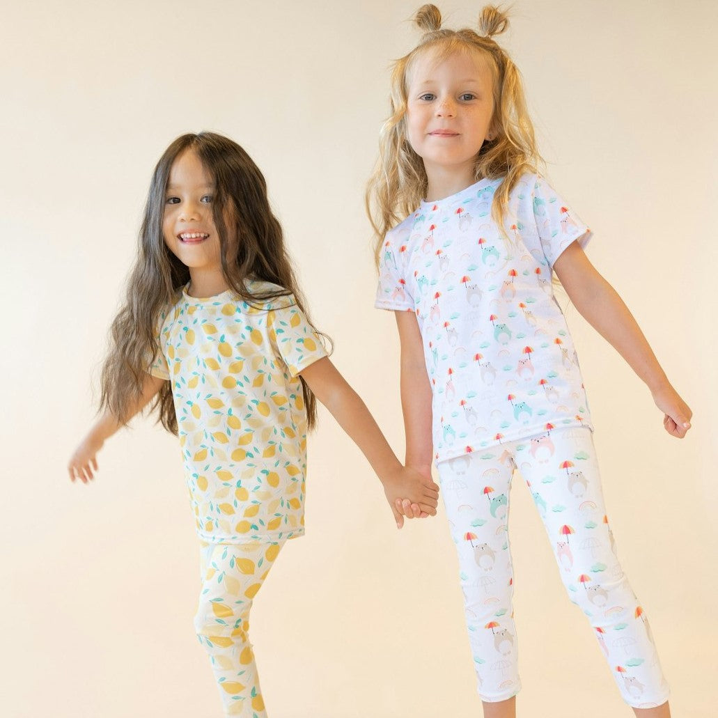 two sets of cute kids leggings and tops