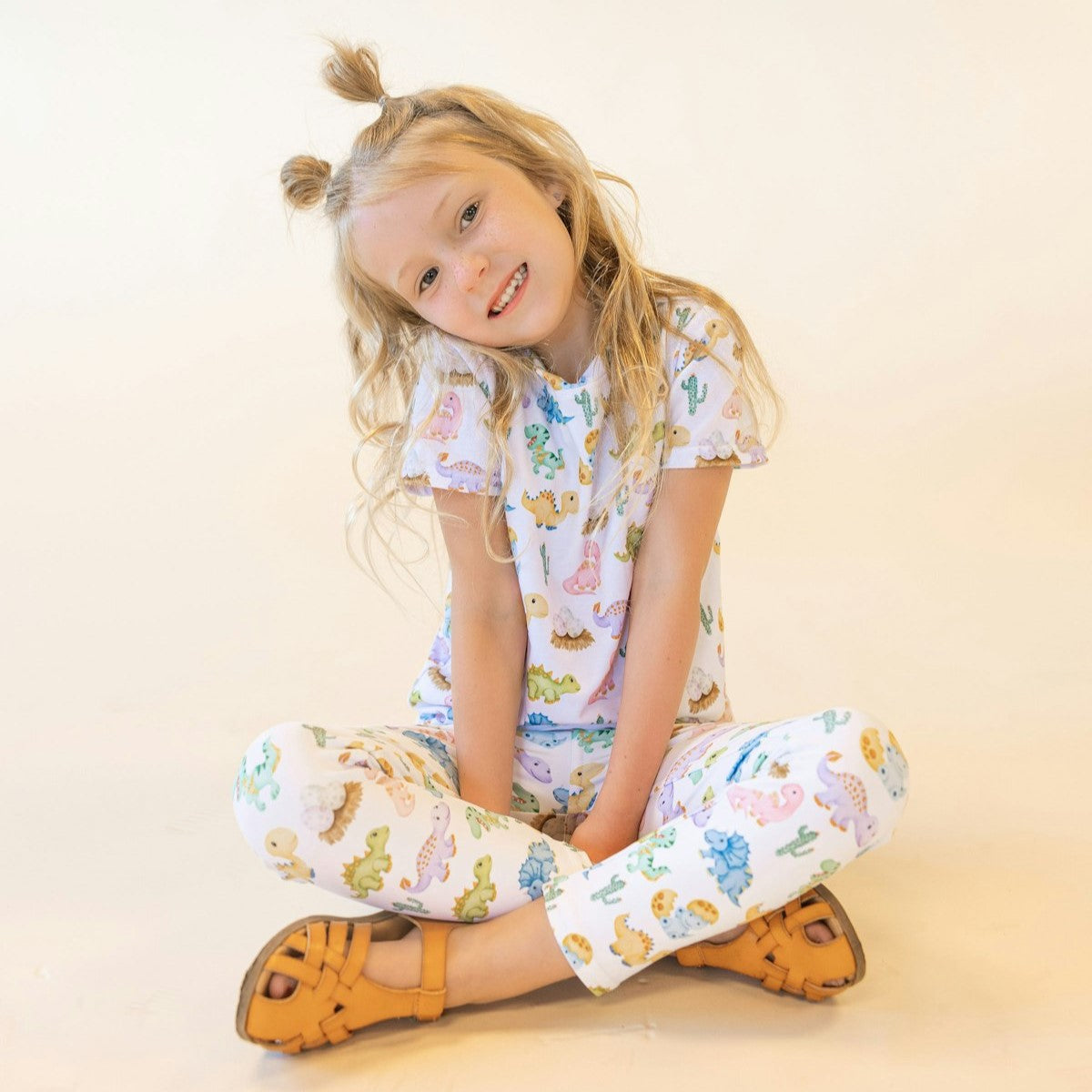 girls set of leggings and top with a cute dino design