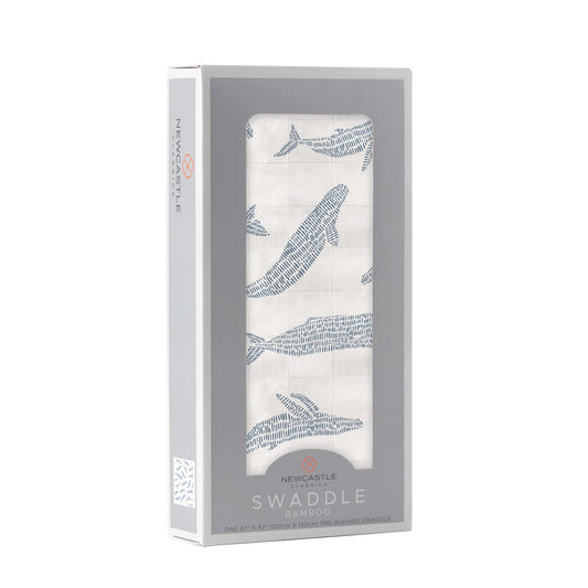Side view of a gift box with baby swaddle